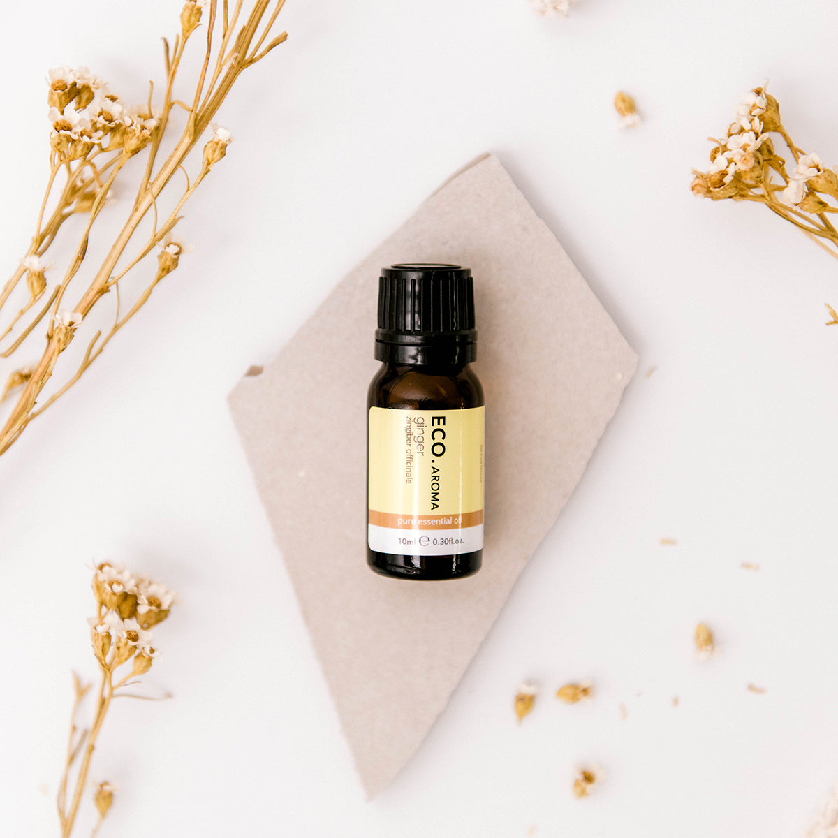 pure ginger essential oil bottle